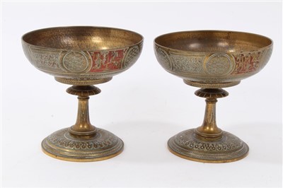 Lot 799 - Pair of low gilded brass urns with Islamic text to enamel panels, stamped to base G. C