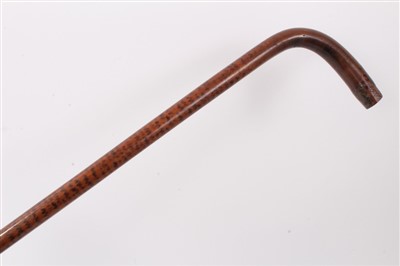 Lot 635 - Unusual Irish carved bog oak walking stick, 19th century patridgwood cane and another cane