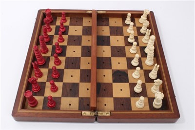 Lot 649 - Early 20th century travelling chess set in mahogany case