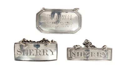 Lot 311 - Three silver decanter labels - various