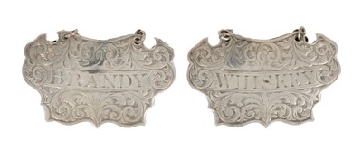 Lot 294 - Pair Victorian silver decanter labels, 'BRANDY' and 'WHISKEY' (Birmingham 1857), John Tongue