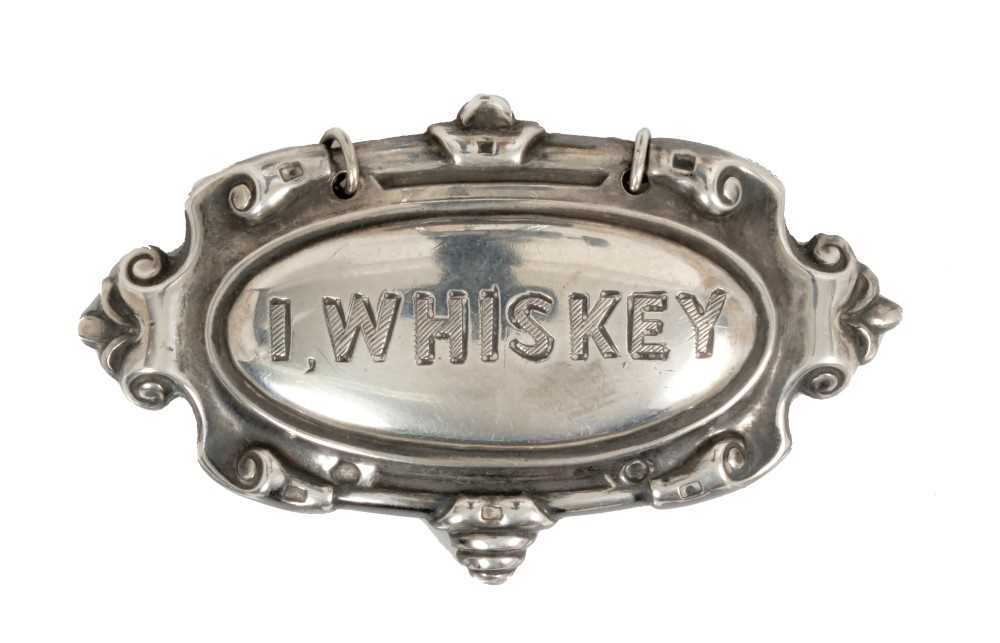 Lot 295 Late Victorian silver decanter label, 'I.