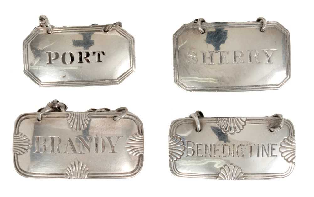 Lot 318 - Four silver decanter labels - various