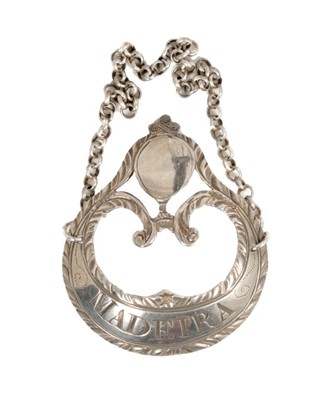 Lot 304 - George III silver decanter label, 'MADEIRA' (lion passant only), Hester Bateman