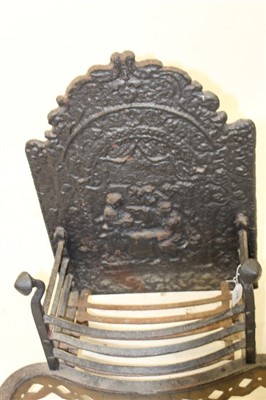 Lot 1338 - Antique fire back with shaped brass front to grate