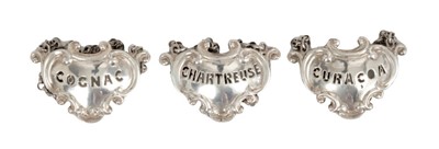 Lot 307 - Set three Victorian silver decanter labels 'COGNAC', 'CURACOA', 'CHARTREUSE' (London 1874), Garrard