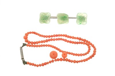 Lot 500 - Chinese Jade brooch, coral necklace, beads