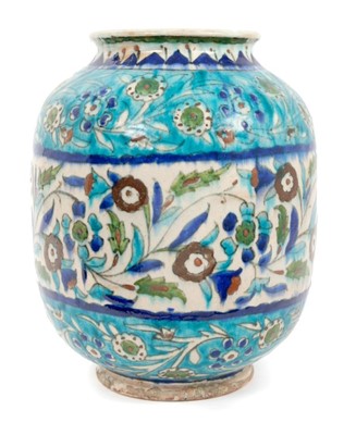 Lot 64 - Early 20th century Iznik pottery baluster vase