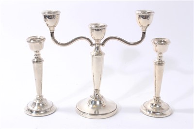 Lot 333 - 1920s silver three-light candelabrum and pair of contemporary silver candlesticks