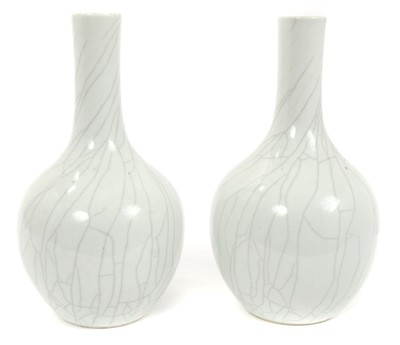 Lot 52 - Pair Chinese Qing crackle glazed blanc-de-chine bottle vases