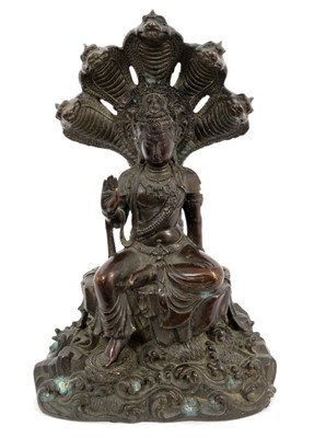 Lot 710 - Antique Cambodian bronze Naga Buddha