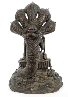 Lot 710 - Antique Cambodian bronze Naga Buddha