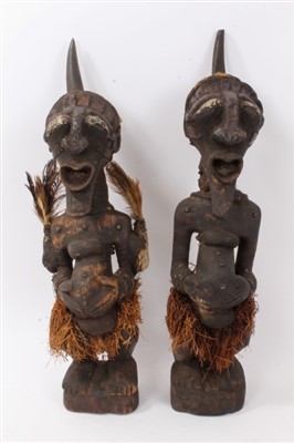 Lot 713 - Pair of Songye Nkisi or power figures