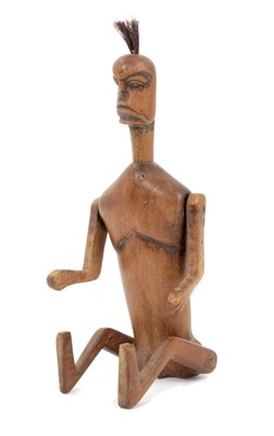 Lot 715 - Rare antique tribal articulated wooden puppet figure, 20cm high