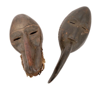 Lot 716 - Early Ivory Coast Dan baboon mask, 30cm high and a similar toucan mask