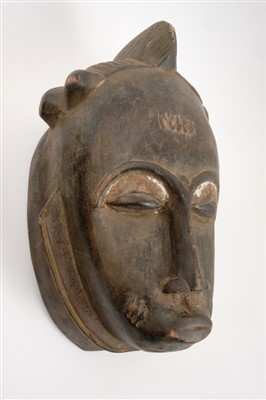 Lot 717 - Antique carved Chokwe tribe mask and two further tribal masks