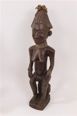 Lot 720 - Yoruba tribe fertility figure and two other female fertility figures
