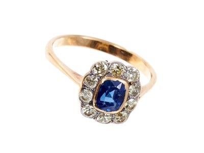 Lot 435 - Sapphire and diamond cluster ring