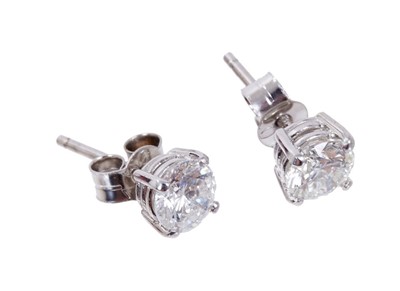 Lot 454 - Pair of diamond stud earrings, estimated total diamond weight 1.04cts