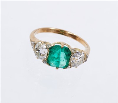 Lot 471 - Emerald and diamond three stone ring, emerald 1.71cts, estimated total diamond weight 1.70cts