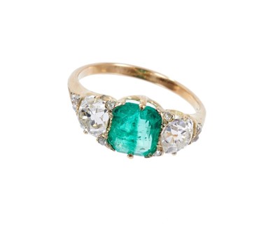 Lot 471 - Emerald and diamond three stone ring, emerald 1.71cts, estimated total diamond weight 1.70cts