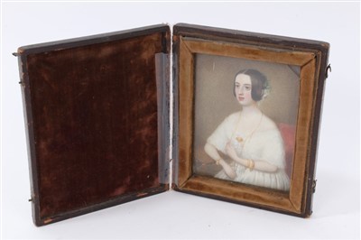 Lot 749 - English School.  Circa 1835, portrait miniature on ivory of a lady in white dress