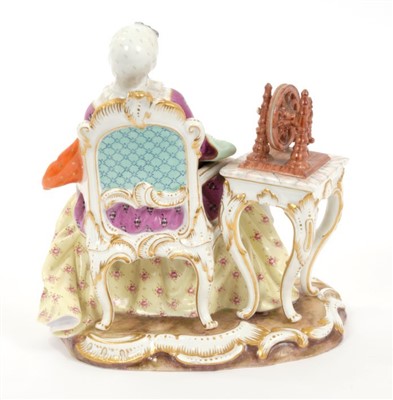Lot 66 - 19th century Meissen outside decorated figure of a seated lady holding a bible