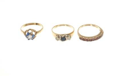 Lot 460 - Three gold (9ct) gem set dress rings