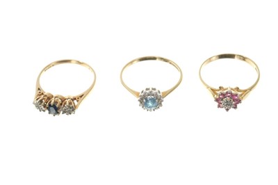 Lot 476 - Three gold (9ct) gem set dress rings