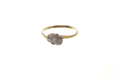 Lot 482 - 1930s diamond crossover ring in 18ct gold and platinum setting. Ring size O