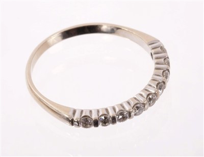 Lot 498 - French 18ct white gold diamond half eternity ring