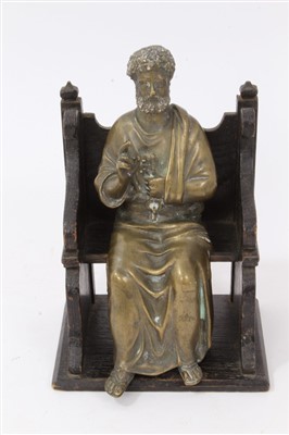 Lot 812 - 19th century brass figure of St Peter, seated on carved throne