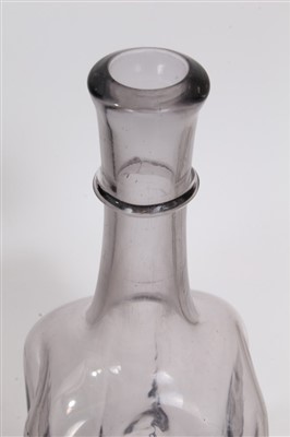 Lot 87 - Antique grey glass bottle with string collar
