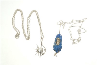 Lot 496 - 1950s silver pendant of abstract design on chain and lapis lazuli and silver pendant on chain