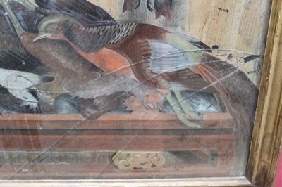 Lot 89 - 19th century reverse painted picture on glass panel depicting a larder interior with dead game, fowl and songbirds, in gilt frame, 45cm x 51cm