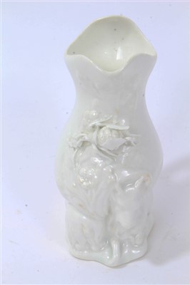 Lot 104 - Chelsea-type blanc-de-chine goat and bee jug