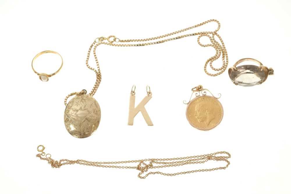 Lot 505 - Sovereign pendant, 18ct gold ring, K pendant, smokey quartz pendant, locket on chain