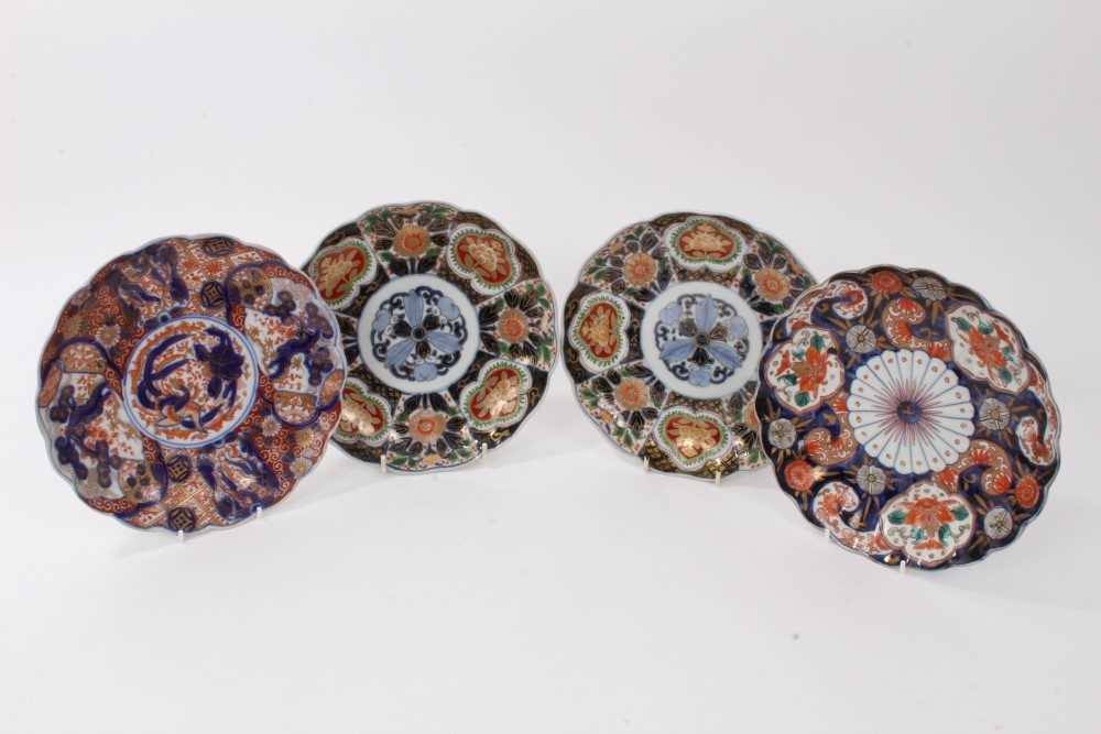 Lot 153 - Pair late 19th century Japanese Imari fluted plates with floral decoration and two others (4)