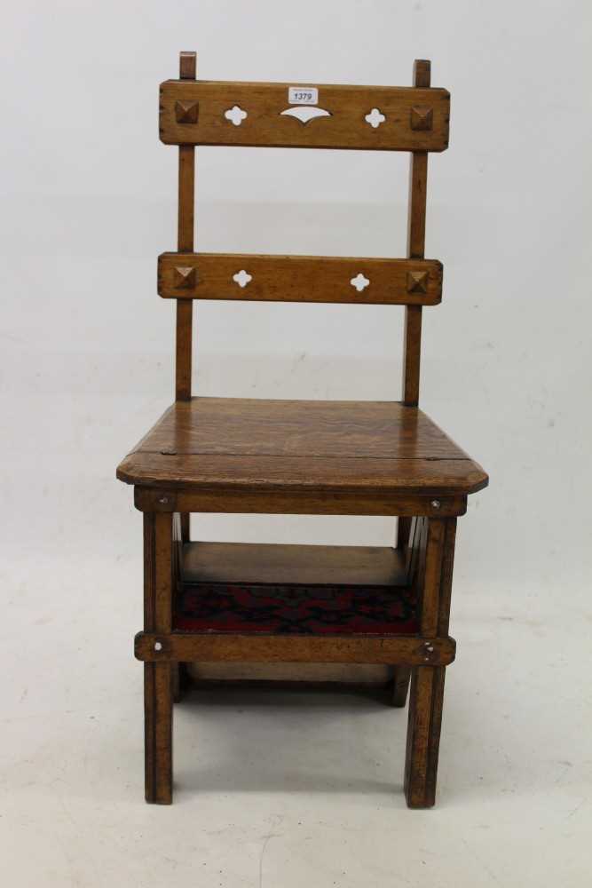 Lot 1379 - Victorian Gothic oak metamorphic library