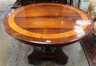 Lot 813 - 19th century and later mahogany circular dining table, with tilt top on unusual pineapple form column and shaped platform on bun feet, 122cm diameter