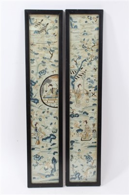 Lot 834 - Pair of early 20th century Chinese silk sleeves depicting figures in gardens, in glazed frames