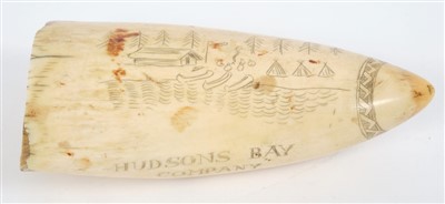 Lot 595 - Unusual antique scrimshaw whale's tooth, engraved to with naval ship, a cannon and crossed ram-rods