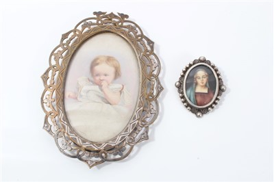 Lot 832 - Edwardian portrait miniature of a young child, oval and a religious portrait miniature