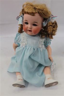 Lot 2713 - Doll Armand Marseille 990 A 6 M Highly coloured cheeks, blue sleeping eyes, open mouth top two teeth showing, painted brows lashes and lips.  Composite body and bent limbs.