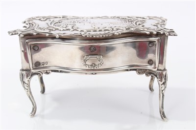 Lot 2717 - Edwardian silver miniature dressing table, by William Comyns, London 1901, of serpentine form with single drawer on cabriole legs, 15cm wide