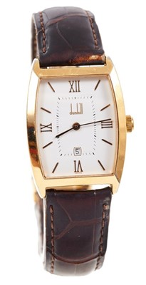 Lot 608 - Gentlemen’s Dunhill wristwatch with quartz movement, tonneau shape dial with applied gold Roman numerals and baton hour markers, dare aperture in gold plated case