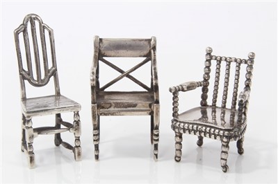 Lot 2723 - miniature silver open armchair, by Levi & Salaman, Birmingham 1917, in the early 19th century style, impressed with patent number and ‘Napoleon 1769-1821’, 5cm high, one other