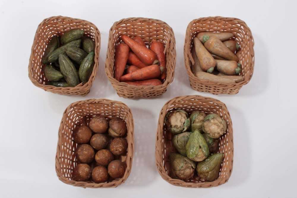 Lot 3775 - Collection of antique miniature painted ceramic vegetables, carrots, cauliflowers etc, presented in woven baskets