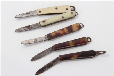 Lot 2739 - Collection of miniature penknives, each with folding blade, in bone or tortoiseshell, 2cm and smaller, together with miniature cutlery