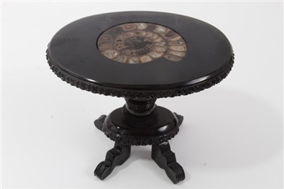 Lot 2741 - 19th century miniature ebonised occasional table, the oval top with inset ammonite cross section, 7cm high